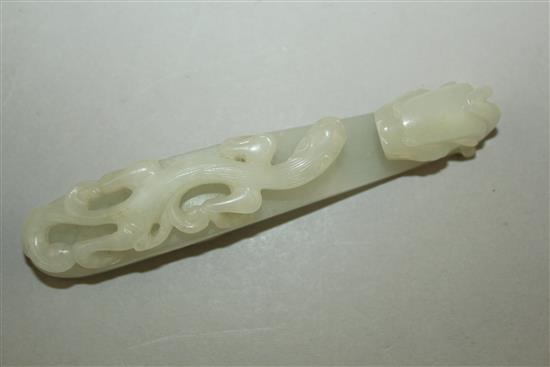 A Chinese white jade dragon belt hook, 18th / 19th century, 11.3cm